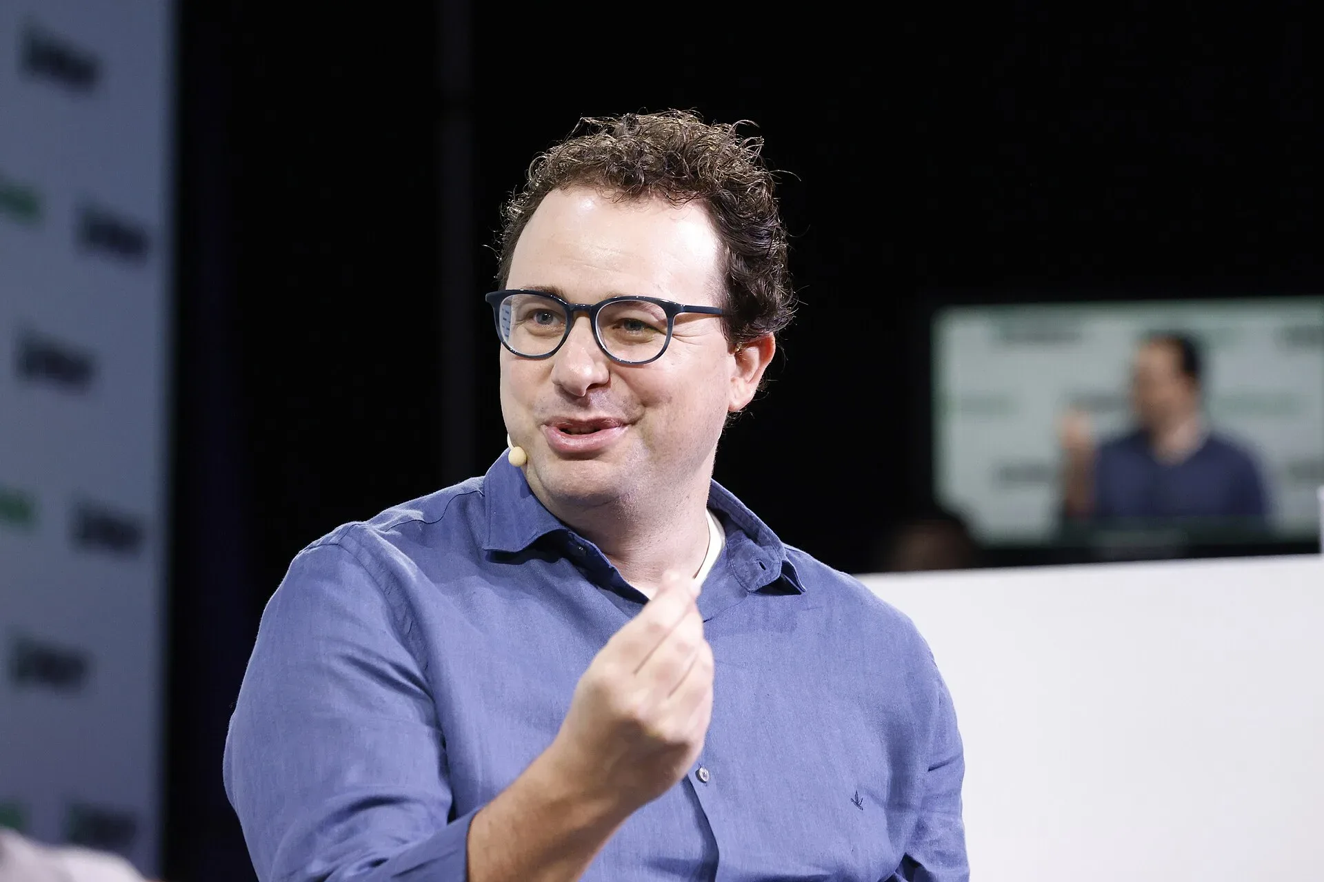 Dario Amodei, co-founder of Anthropic, speaking on stage at TechCrunch Disrupt in 2023