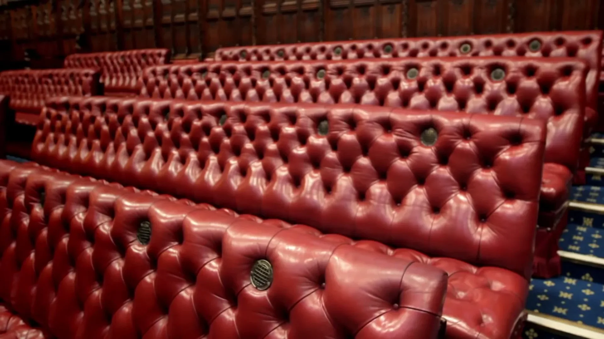 Red leather benches in the chamber of the House of Lords