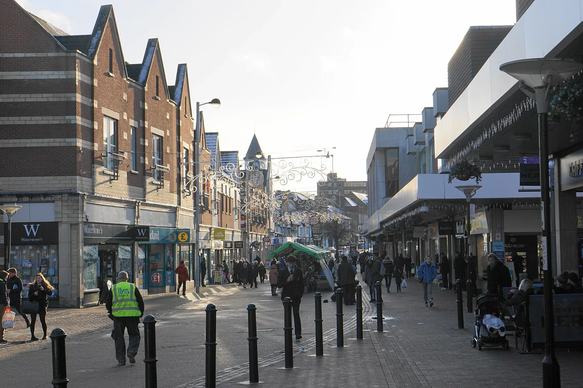 Shoppers walking along the Parade in Sutton Coldfield town centre