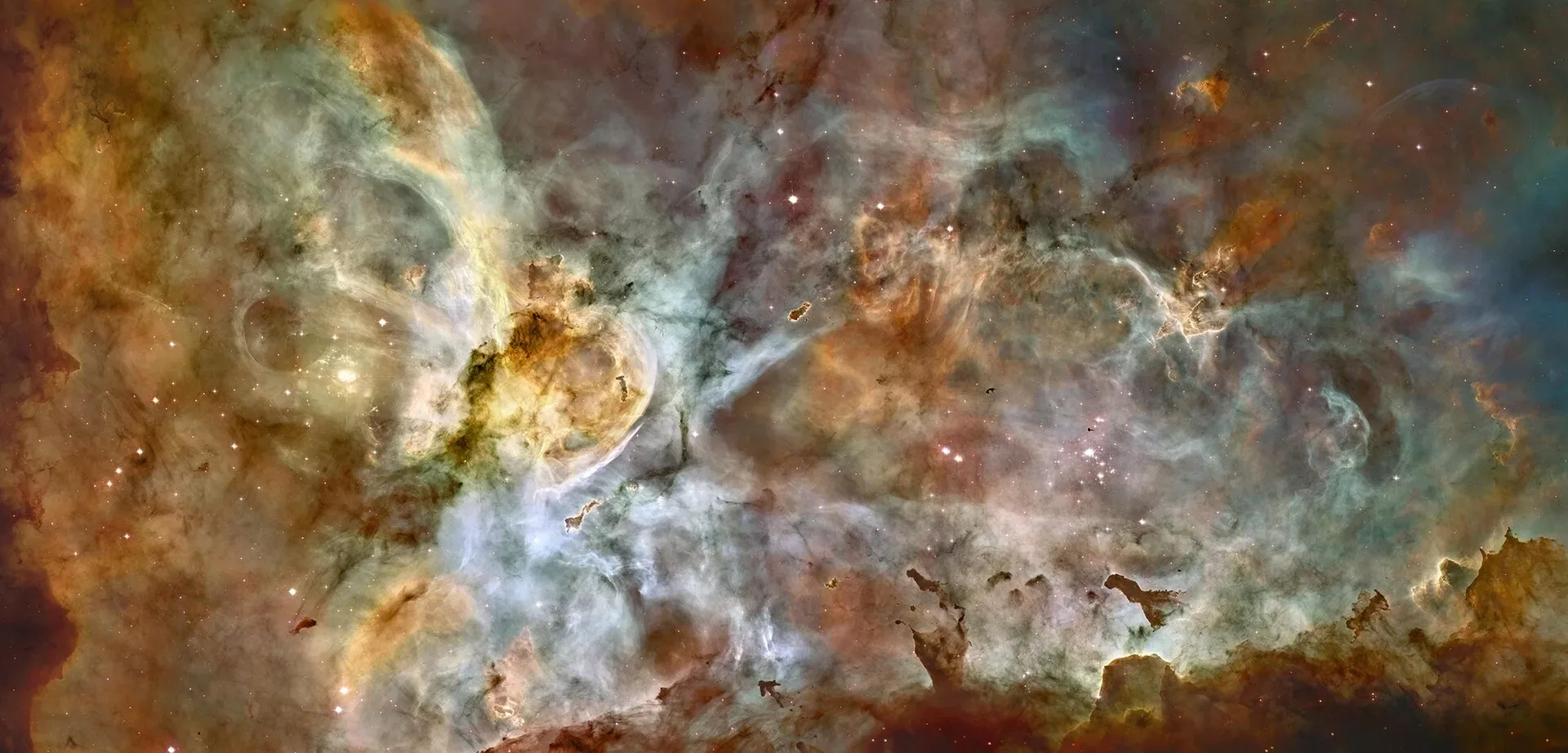 Clouds of glowing gas and dust in the Carina Nebula, photographed by Hubble