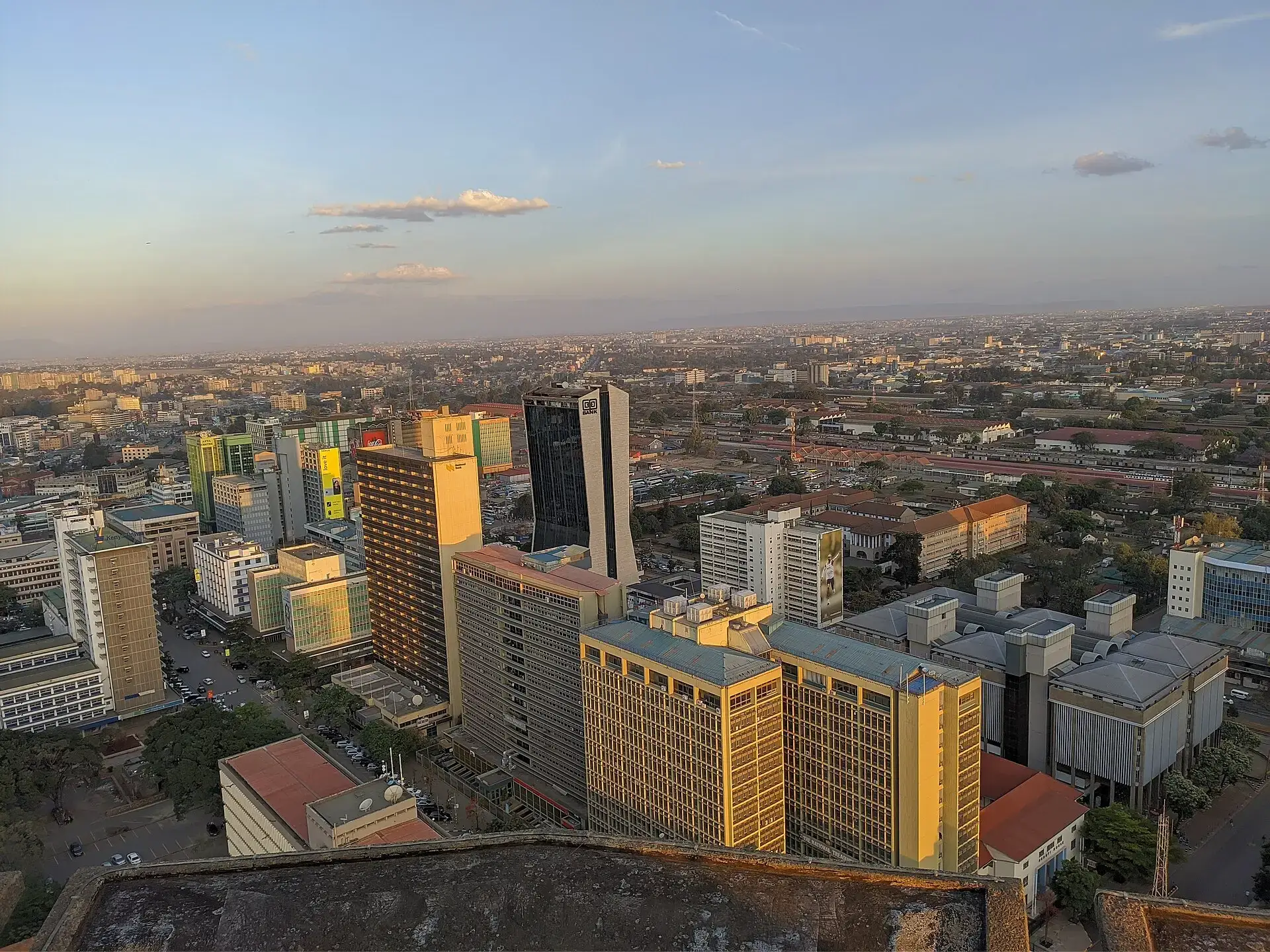 An aerial view of the Nairobi skyline at golden hour